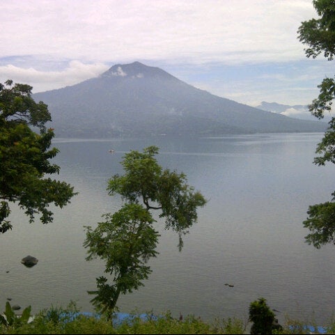 Photo taken at Kawasan Wisata Danau Ranau by Riky O. on 3/12/2013